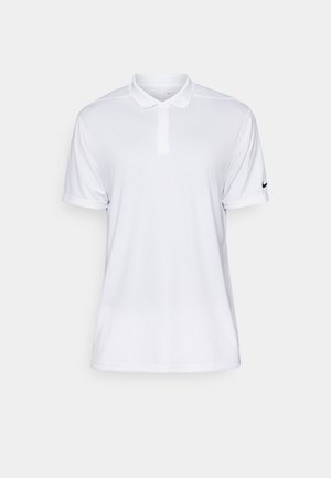 Biała koszulka polo z krótkim rękawem, wykonana z tkaniny syntetycznej. Posiada kołnierzyk oraz czarne logo Nike na lewym rękawie.