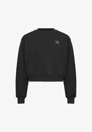Zwart cropped sweatshirt gemaakt van gestructureerde stof. Heeft een ronde halslijn en lange mouwen. Inclusief een subtiel logo op de borst.