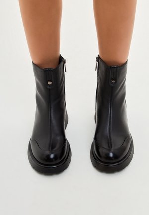 Bottines à plateau - black