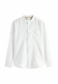 Chemise blanche à manches longues avec un col boutonné, une poche au front et un tissu texturé. Comprend des boutons discrets et un ourlet arrondi.