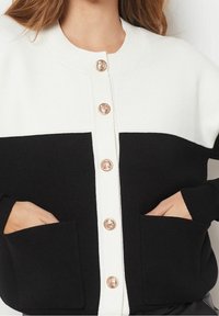 Etam Strickjacke - black