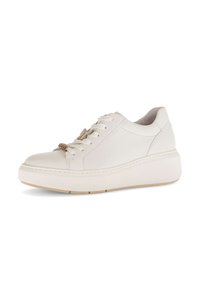 White leather sneakers feature a rounded toe, thick white sole, and laces with gold hardware accents, providing a smooth texture and modern design.