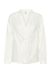Blusa bianca a maniche lunghe con scollo a V profondo e dettaglio a nodo intrecciato al centro davanti, vestibilità ampia e polsini con bottoni.