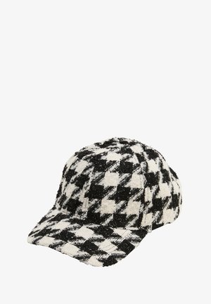 Cappello con motivo houndstooth in bianco e nero, realizzato in un tessuto testurizzato con visiera curva e dettagli cuciti.