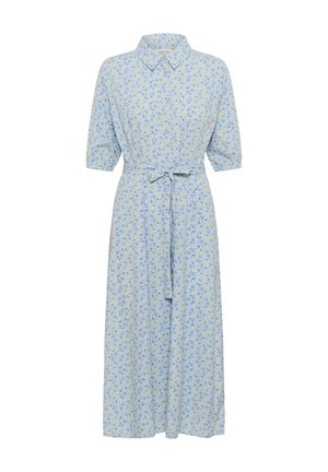 Jasnoniebieska sukienka z kołnierzykiem, krótkimi bufiastymi rękawami i paskiem do wiązania. Posiada kwiatowy wzór w odcieniach żółtego i ciemniejszego niebieskiego. Długość sięga do połowy łydki.