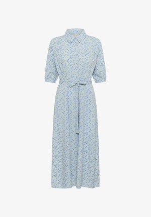 Jasnoniebieska sukienka z kołnierzykiem, krótkimi bufiastymi rękawami i paskiem do wiązania. Posiada kwiatowy wzór w odcieniach żółtego i ciemniejszego niebieskiego. Długość sięga do połowy łydki.