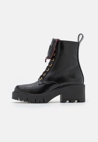 EYELIKE BOOT - Botas de tornozelo com plataforma - black