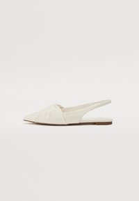 White slingback flats made of smooth leather. Features a pointed toe, soft gathered detail on the upper, and a minimalistic flat sole.