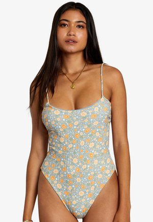 Patterned one-piece swimsuit in light blue, featuring orange and white floral designs, thin straps, and a high-cut leg shape.