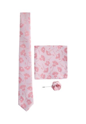 Rosa Krawatte, Einstecktuch und Blumen-Reversnadel mit passendem Blumenmuster auf hellrosa Hintergrund.