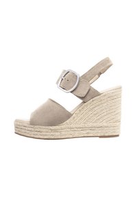 Beige suede wedge sandals with an ankle strap, silver buckle, and woven jute texture on the wedge, featuring an open toe design.