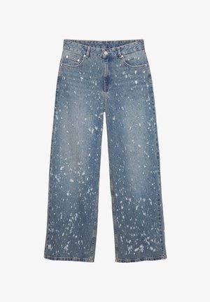 Faded blue denim wide-leg jeans with a high waist, showing a distressed design and white paint splatter throughout, featuring front pockets.