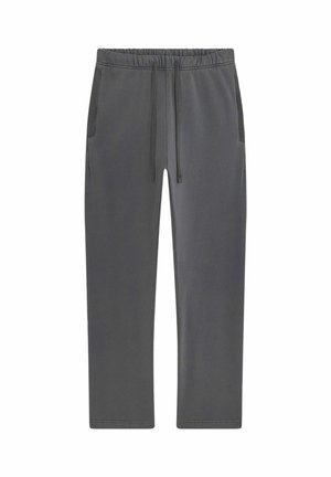 Pantalon de survêtement gris foncé avec taille élastique, cordon de serrage et détails côtelés sur les poches latérales.