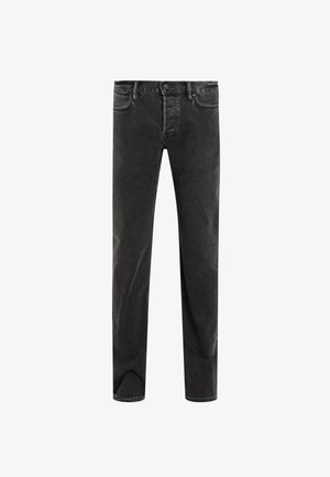 Mustat farkut suoraan lahkeella, joissa on napitus ja viisi taskua. Pehmeä pinta, jossa on hienovaraisia haalistumisia.