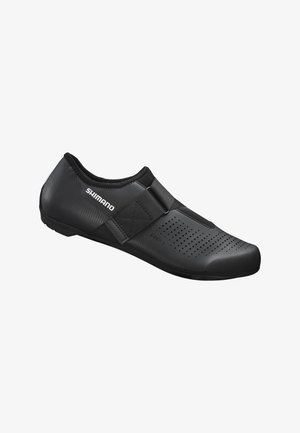 Zapato de ciclismo negro con un diseño elegante, fabricado con material sintético, que presenta una parte superior texturizada, una correa de velcro y detalles perforados para favorecer la transpirabilidad.