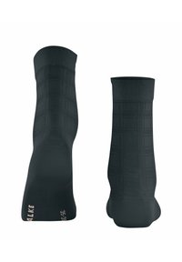 Schwarze Knöchelsocken mit einem Rautenmuster, ausgestattet mit einem gerippten Bündchen und einer verstärkten Zehenpartie. Größe 35-39 auf der Sohle markiert.