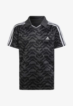 Polo manches courtes noir Adidas avec motif abstrait de feuilles foncées, triples bandes blanches sur les manches et logo Adidas sur la poitrine.
