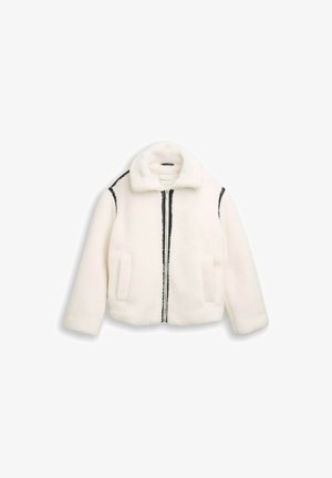 Weißer Kunstfell-Jacke mit schwarzem Reißverschluss und Futter. Verfügt über einen Kragen und zwei Vordertaschen. Weiche Textur, kastige Form.