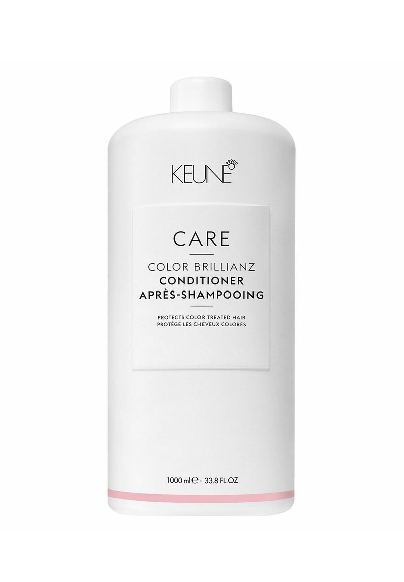 Bottiglia cilindrica bianca di balsamo con una striscia rosa nella parte inferiore. L'etichetta frontale recita "KEUNE CARE COLOR BRILLIANZ CONDITIONER". 1000 ml.