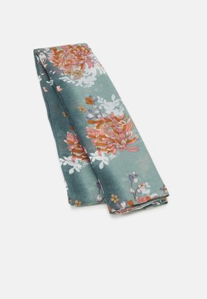Écharpe en tissu bleu sarcelle pliée avec de grands motifs floraux roses et orange et de petites fleurs blanches et jaunes sur un fond uni.