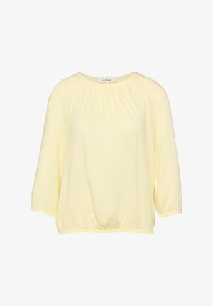 Light yellow women’s blouse with three-quarter puffed sleeves, round neckline with gathers, and elastic hem and cuffs.