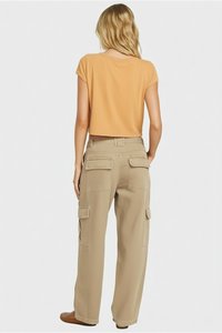 Cropped orange t-shirt and beige cargo pants with side pockets, featuring a relaxed fit and soft fabric, shown from the back.