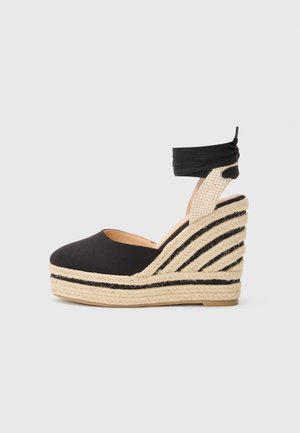 RUNI - Wedge sandals - black