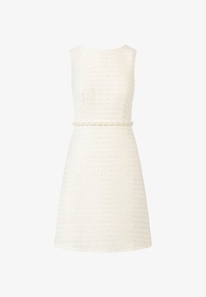 White sleeveless dress with a textured fabric, featuring a pearl detail belt at the waist and subtle shimmer throughout the fabric.