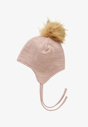 Light pink knit hat with ear flaps, ties, and a fluffy tan pom-pom on top. Soft texture with a smooth finish.