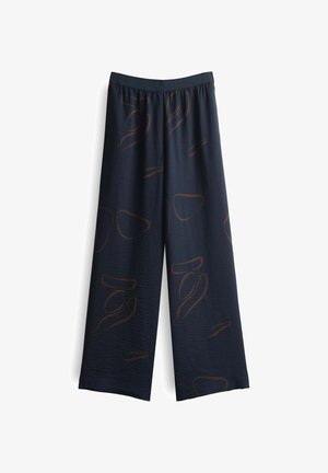Weite Hosen aus navy-farbenem Stoff mit strukturierter Oberfläche, die abstrakte braune Muster aufweisen und über einen elastischen Taillenbund für zusätzlichen Komfort verfügen.