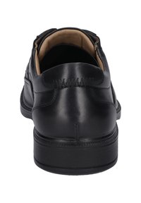 Schwarze Lederschuhe mit abgerundetem Absatz, glatter Oberfläche und kontrastierenden Stichdetails entlang des Obermaterials für einen klassischen Look.