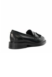 Black leather loafers with a flat sole, tasseled accent, and stitched detailing along the upper. Smooth texture with a classic silhouette.