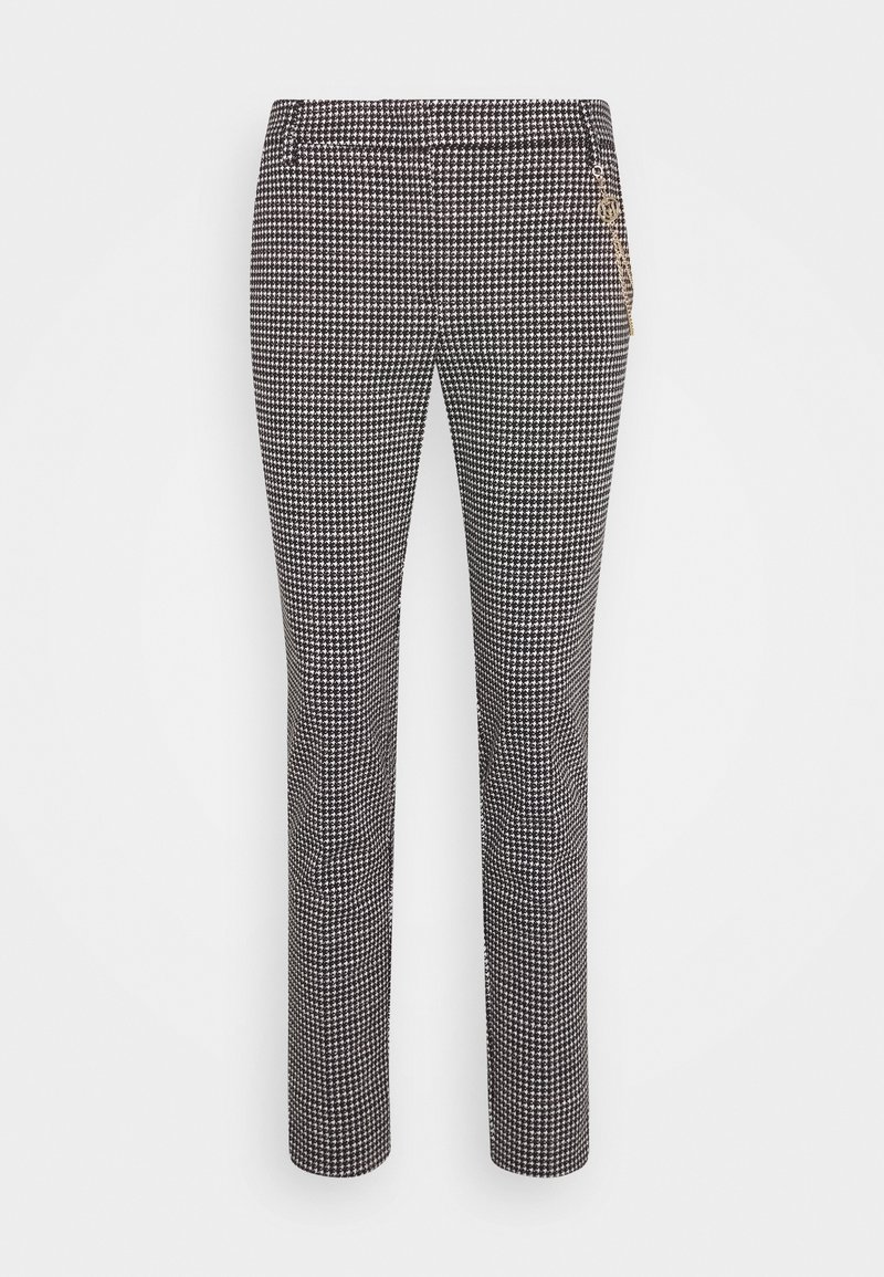 Pantalon à motif pied-de-poule noir et blanc avec une coupe slim, doté d'une fermeture éclair et de poches à l'avant. Texture lisse.