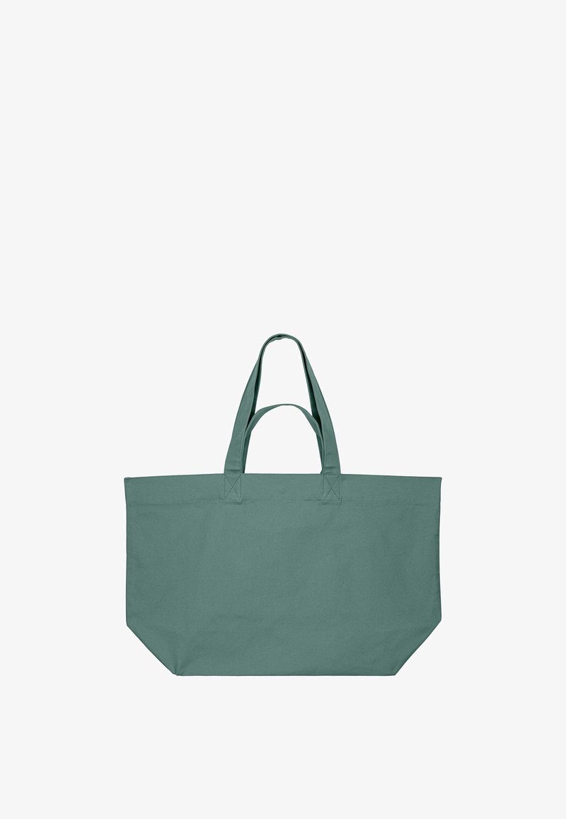 Grand sac cabas rectangulaire vert olive avec doubles anses plates, en tissu, présenté sur un fond blanc.