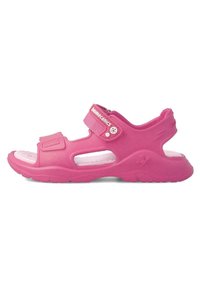 Pinke Gummisandale mit einem strukturierten Riemen, verstellbarem Klettverschluss, offenes Design und ausgeschnittenen Abschnitten zur Belüftung. Flache Sohle.