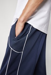 HUF WIREFRAME TRACK PANT UNISEX - Joggebukse - navy