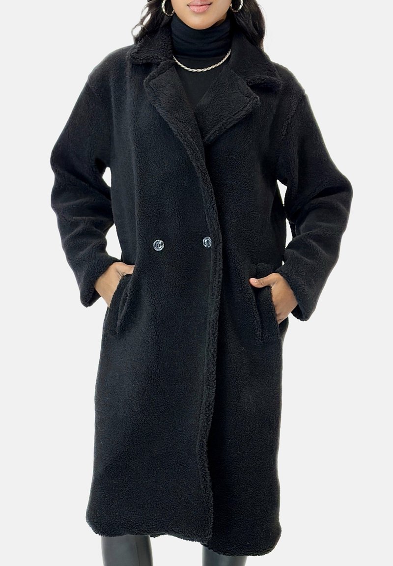 Schwarzer Mantel aus weichem Fleece mit Kragen, zwei vorderen Taschen und doppelter Knopfverschluss, mit strukturierter Oberfläche und legerer Passform.