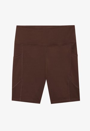 Ruskeat urheilushortsit, jotka on valmistettu sileästä kankaasta, ja niissä on korkea vyötärö, sivutaskut ja kontrastiväriset stitching-tiedot.