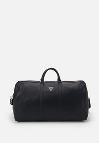 Black leather duffel bag with a zip closure, two top handles, adjustable shoulder strap, and silver logo on the front. Smooth texture.