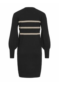 Robe noire à manches longues, longueur genou, avec trois bandes horizontales beiges sur la poitrine et manches bouffantes aux poignets.