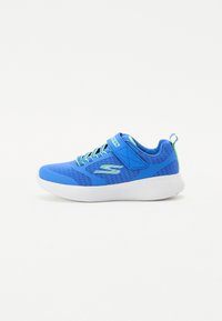 Blue athletic shoes with mesh upper, white sole, green accents, and Velcro strap for secure fit. Round toe and textured design.