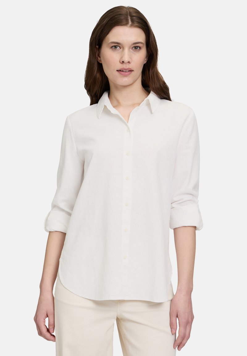 Weißes Button-up-Hemd aus leichtem Stoff, mit Kragen, hochgerollten langen Ärmeln und abgerundetem Saum für eine lässige Passform.