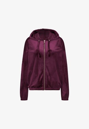 Chaqueta con capucha de terciopelo púrpura con cierre de cremallera, dos bolsillos frontales y puños acanalados. Textura suave y ajuste relajado.