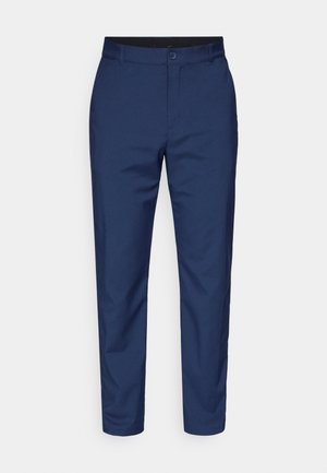 Σκούρο μπλε παντελόνι φτιαγμένο από λεία ύλη. Διαθέτει κλείσιμο με κουμπί, θηλιές για ζώνη και κομμένο στυλ με ελαφρώς στενούς μηρούς.