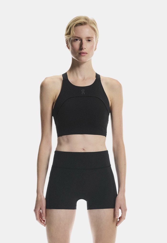 On PERFORMANCE CROP - Medium support sports bra - black