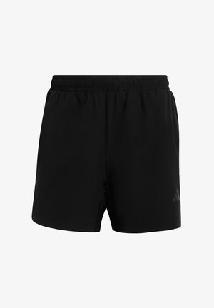 Zwarte sportbroekjes met een elastische tailleband, gemaakt van lichtgewicht materiaal, met een subtiel logodetail aan de zijkant.