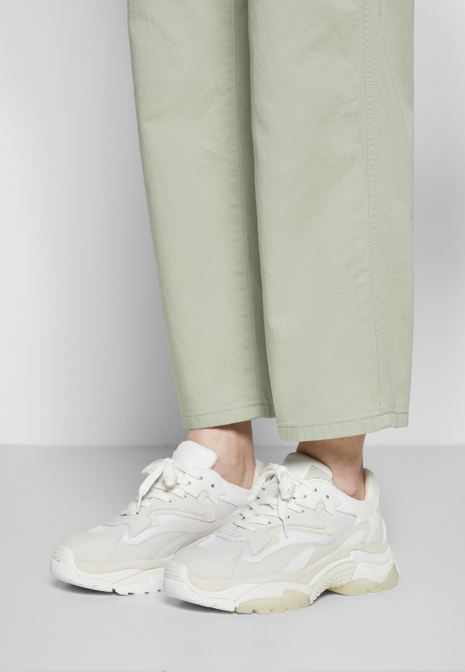 ash addict trainers white