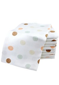 Katoenen tafelkleed met een witte achtergrond, voorzien van een ruitpatroon en verspreide cirkelvormige motieven in bruin, oranje, groen en geel.