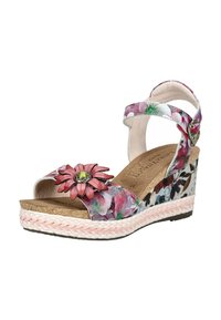 Sandale compensée avec imprimé floral, semelle tressée rose, bride de cheville avec boucle, et grande fleur rose décorative sur la bride avant.
