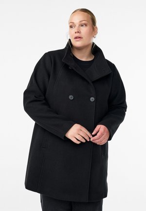 Black wool blend peacoat featuring a high collar, double-breasted buttons, and side pockets. The design offers a relaxed fit and smooth texture.